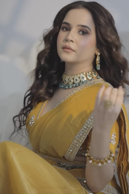Shiv Shakti In Marigold Yellow Tissue Draped Saree Set