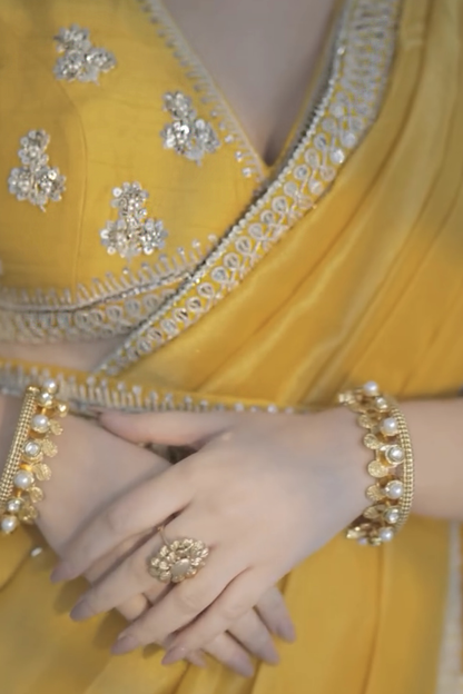 Shiv Shakti In Marigold Yellow Tissue Draped Saree Set