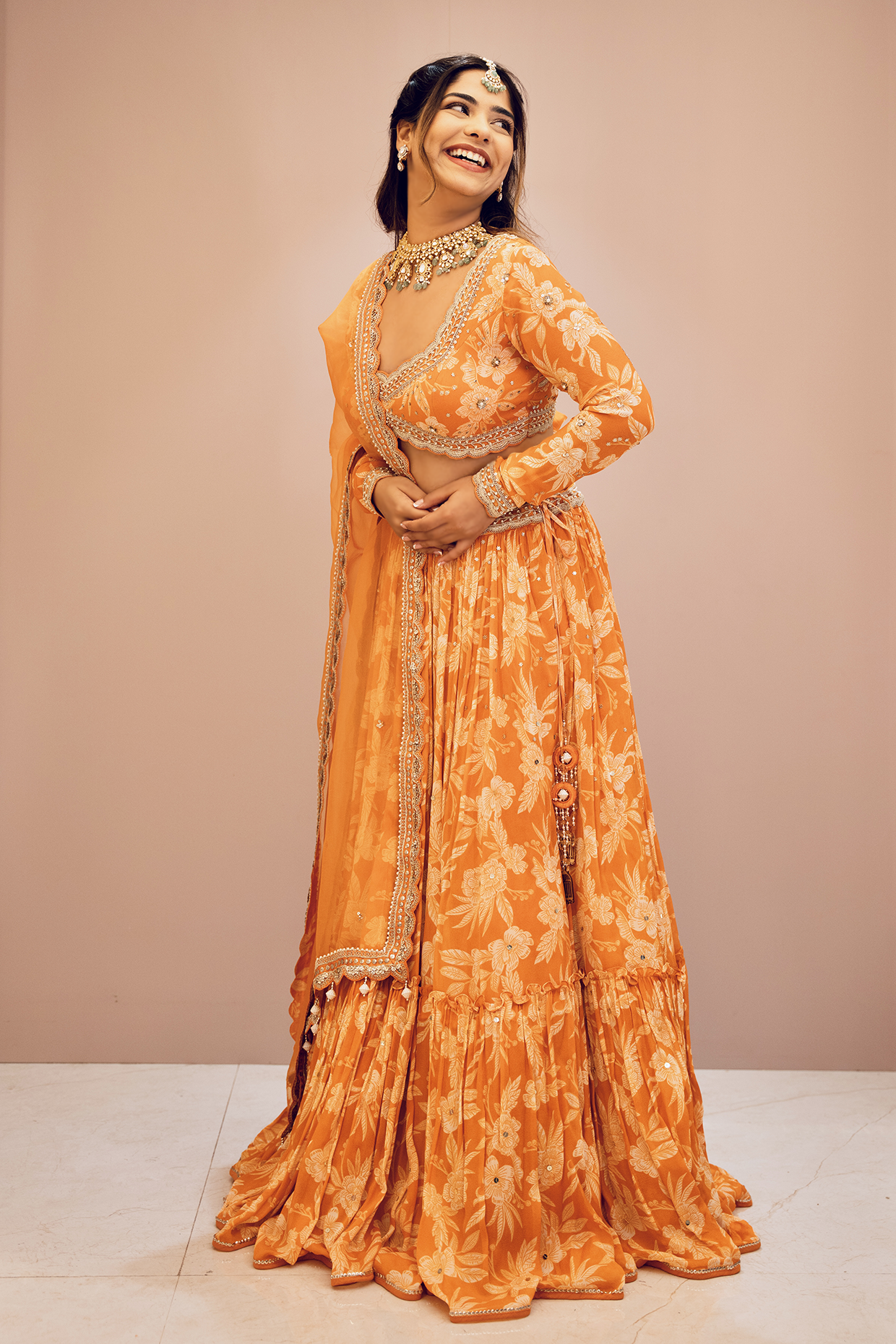 Tanusha Bajaj In Orange Tiered Skirt Set